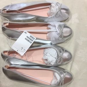 This is 2 pairs new shoes.Size 3 silver $15.each